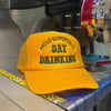 PROUD SUPPORTER OF DAY DRINKING TRUCKER HAT | Gold/Green