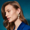 KRISTA BOW STATEMENT EARRINGS in gold white mix