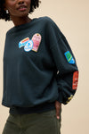 SKI PATCH + PASS COLLECTOR CREW NECK SWEATSHIRT