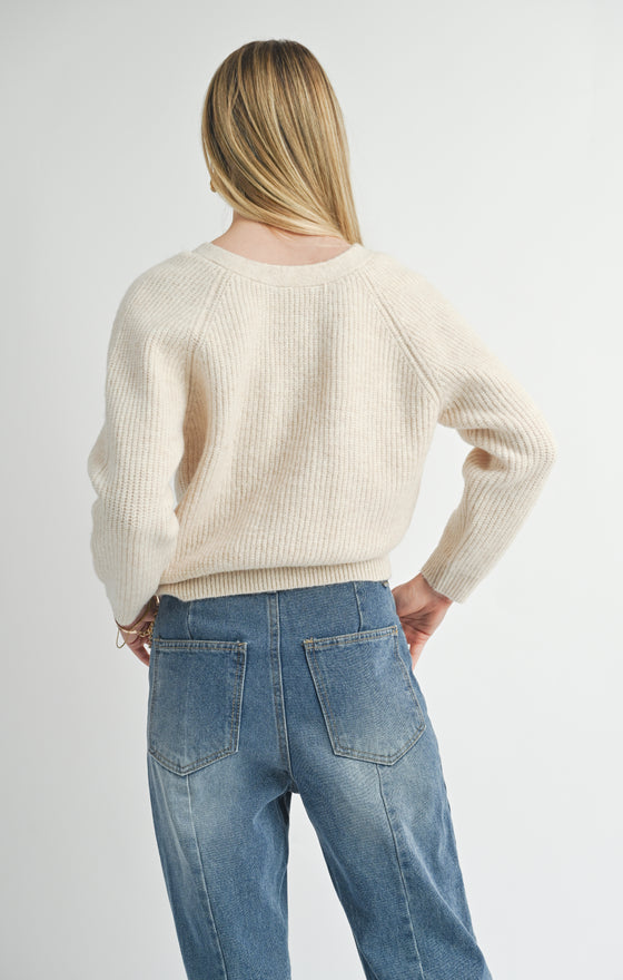 CECE REVERSIBLE TWIST SWEATER