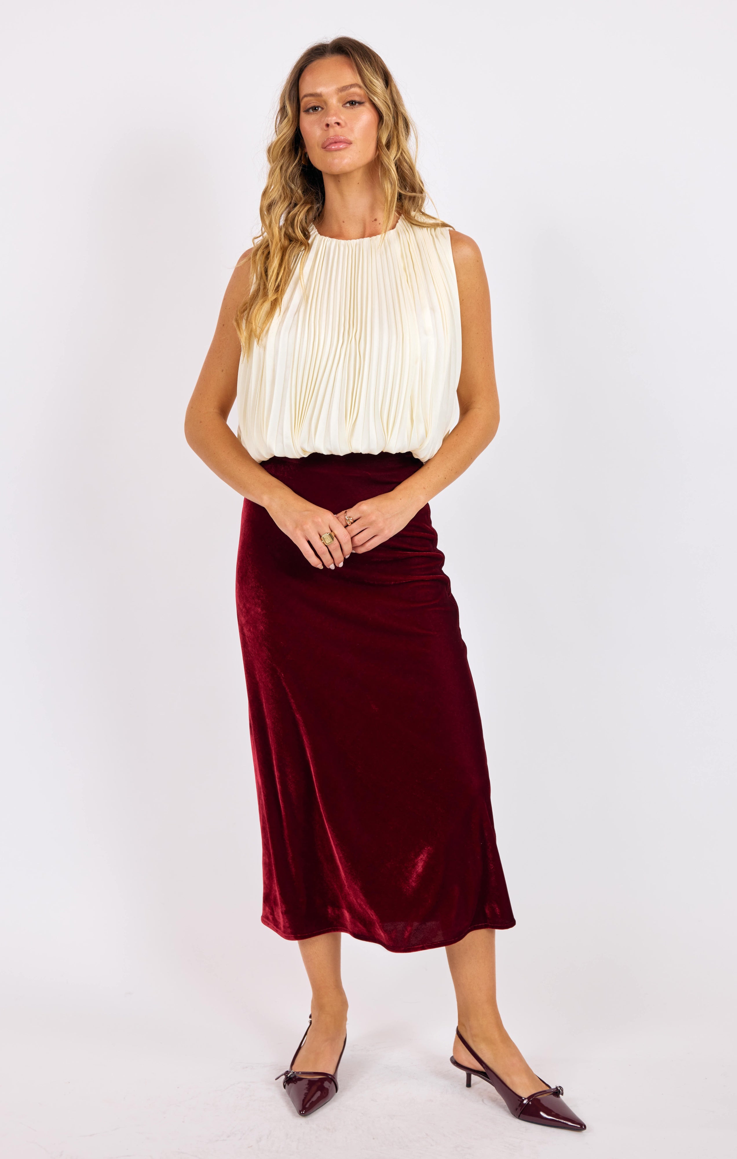 AMOUR PLEATED BUBBLE HEM TOP